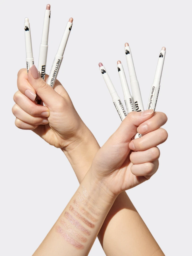 Сияющие тени для век в карандаше в бронзовом оттенке UNLEASHIA Pretty Easy Glitter Stick N°7 Sheer Skin