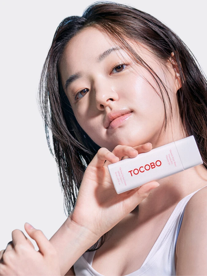 Солнцезащитный крем с комплексом витаминов TOCOBO VIta Tone Up Sun Cream SPF50+ PA++++
