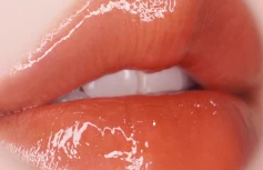Глянцевый тинт-плампер для губ UNLEASHIA Sisua Popcorn Syrup Lip Plumper No. 2 Mango Caramel