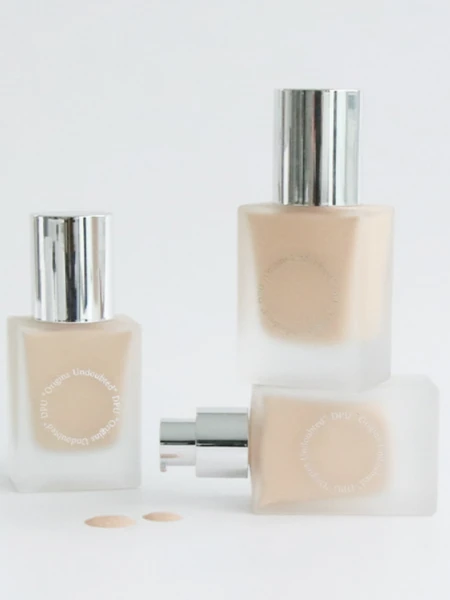 Тональный флюид для лица в бежевом оттенке DPU Mood Airbrush Pro Fit Foundation 23 Natural Beige Тональный флюид для лица в бежевом оттенке DPU Mood Airbrush Pro Fit Foundation 23 Natural Beige