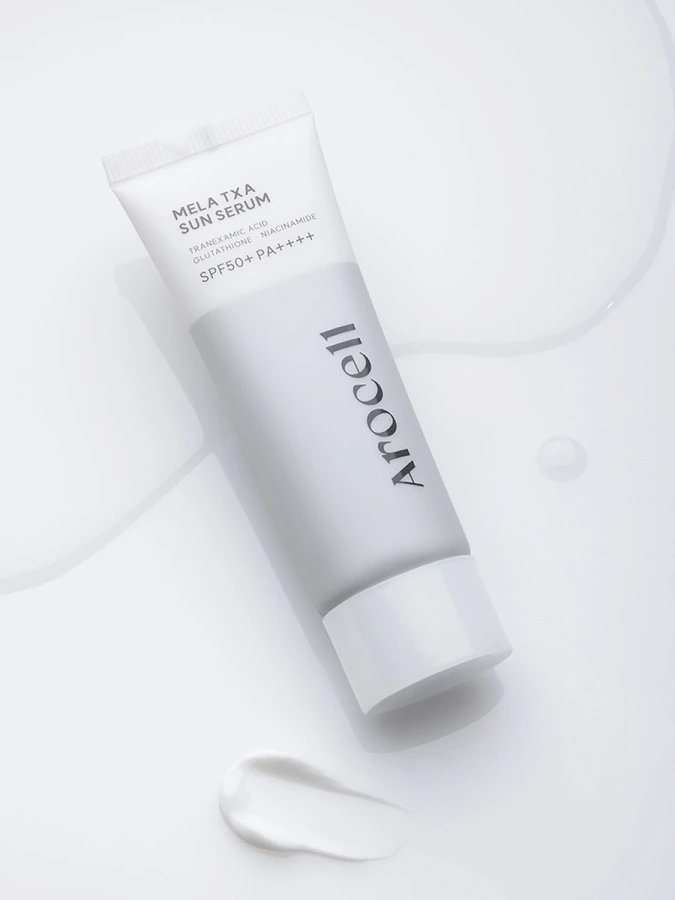 Осветляющий солнцезащитный флюид с транексамовой кислотой Arocell Mela TXA Sun Serum SPF50+ PA++++