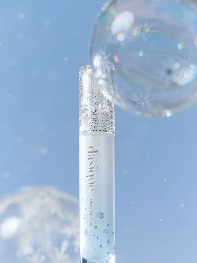 Прозрачный мерцающий блеск для губ Dasique Glowy Lipgloss Holiday Snowball