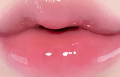 Лёгкий глянцевый блеск для губ fwee 3D Voluming Gloss A03 Candy 30%