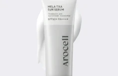 Осветляющий солнцезащитный флюид с транексамовой кислотой Arocell Mela TXA Sun Serum SPF50+ PA++++