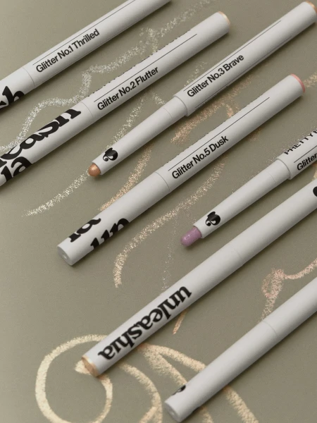 Сияющие тени для век в карандаше в бронзовом оттенке UNLEASHIA Pretty Easy Glitter Stick N°7 Sheer Skin