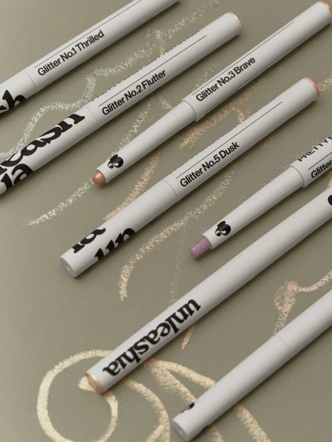 Сияющие тени для век в карандаше в бронзовом оттенке UNLEASHIA Pretty Easy Glitter Stick N°7 Sheer Skin