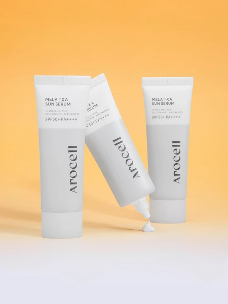 Осветляющий солнцезащитный флюид с транексамовой кислотой Arocell Mela TXA Sun Serum SPF50+ PA++++