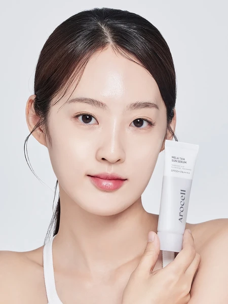 Осветляющий солнцезащитный флюид с транексамовой кислотой Arocell Mela TXA Sun Serum SPF50+ PA++++