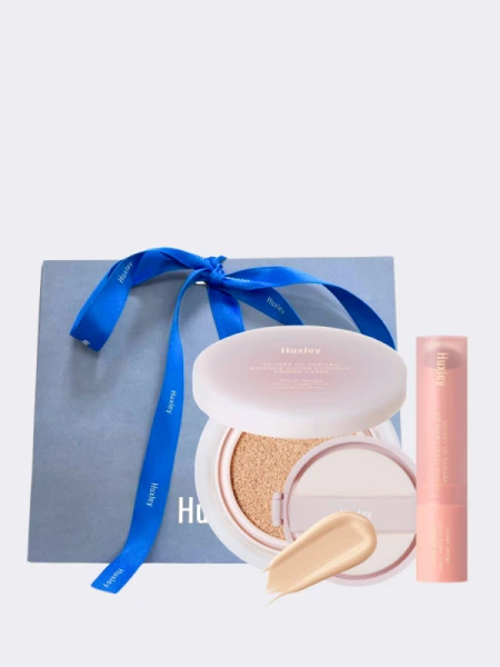 Набор: кушон + рефил + бальзам для губ Huxley Essence Cover Cushion & Lip Balm Set 02 Coral Sand Набор: кушон + рефил + бальзам для губ Huxley Essence Cover Cushion & Lip Balm Set 02 Coral Sand