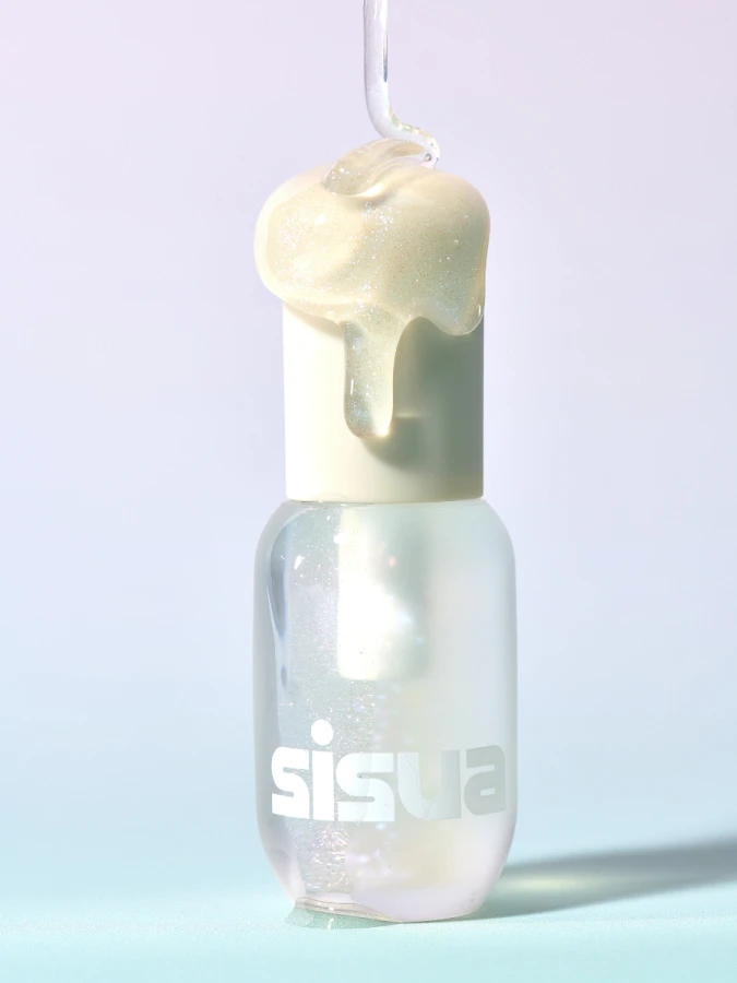 Прозрачный блеск с эффектом увеличения объёма губ UNLEASHIA Sisua Popcorn Syrup Lip Plumper No. 100 Unicorn Salt