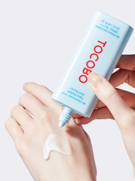 Солнцезащитный флюид для лица с растительными экстрактами TOCOBO Bio Watery Sun Cream SPF50+ PA++++ Солнцезащитный флюид для лица с растительными экстрактами TOCOBO Bio Watery Sun Cream SPF50+ PA++++