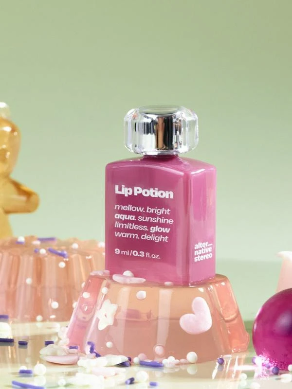 Легкий увлажняющий блеск-тинт для губ ALTERNATIVE STEREO Lip Potion Aqua Glow No.8 Sugar Purple