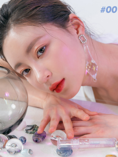 Жидкий прозрачный блеск для губ с сияющими частицами rom&nd Glasting Water Gloss 00 Meteor Track