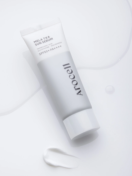 Осветляющий солнцезащитный флюид с транексамовой кислотой Arocell Mela TXA Sun Serum SPF50+ PA++++