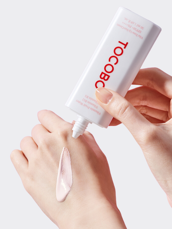 Солнцезащитный крем с комплексом витаминов TOCOBO VIta Tone Up Sun Cream SPF50+ PA++++