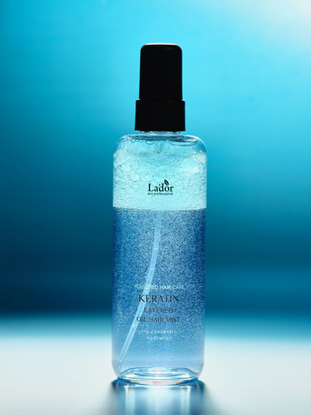 Парфюмированный двухфазный спрей для волос La’dor Keratin Layered Oil Hair Mist Парфюмированный двухфазный спрей для волос La’dor Keratin Layered Oil Hair Mist