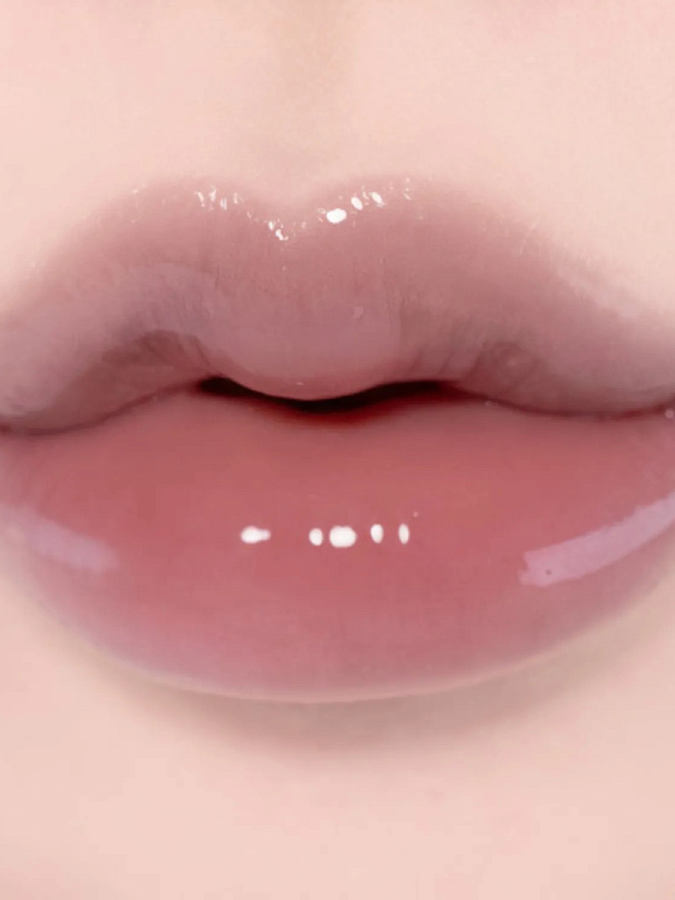 Оттеночный блеск для губ fwee 3D Changing Gloss 01 Scene Black